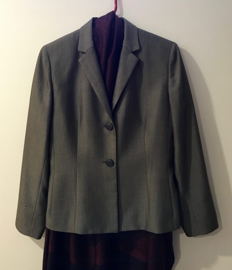 Photo shows a grey blazer, scarf, and black dress (Beth's protective choice for wedding attire).