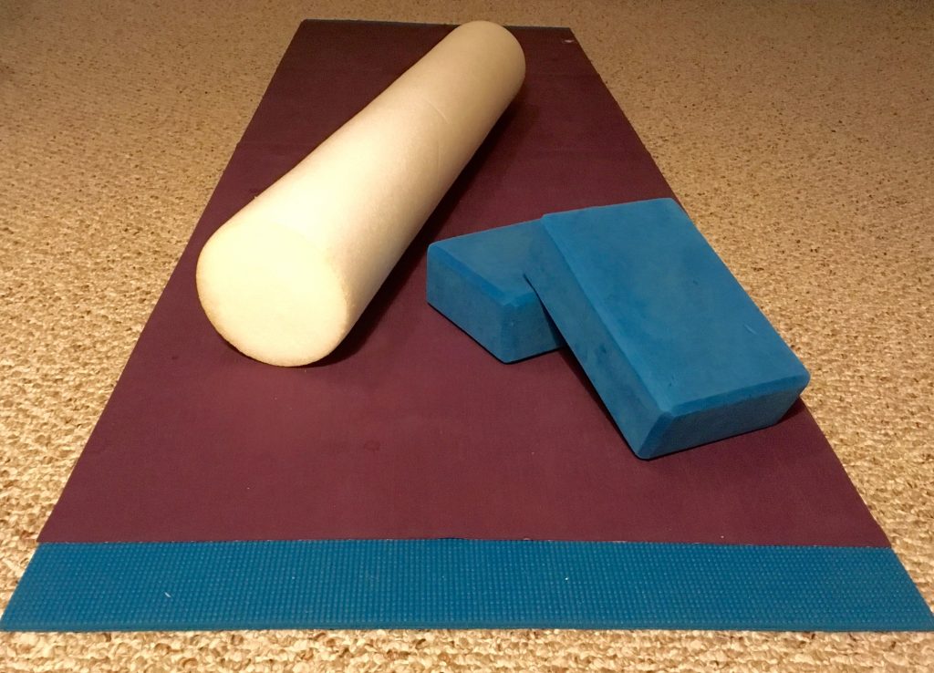 My practice space: yoga mats, blocks, and foam roller.
