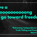 Quote "We have a looooooooooooooong way to go toward freedom" in bright blue font against a dark black background with a dirt road barely visible and stretching beyond the image.