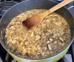 Onions and mushrooms simmer in vegetable broth and seasonings.