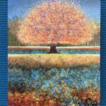This cover of my current journal features a bright, colorful tree surrounded by vibrant earth and sky.